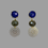 Thumbnail: Calista Ohrringe aus Edelsteinen mit Metallornament