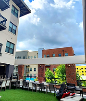 Rooftop soft wash of exterior and water reclaimation surface cleaning in Collegetown, Tallahassee