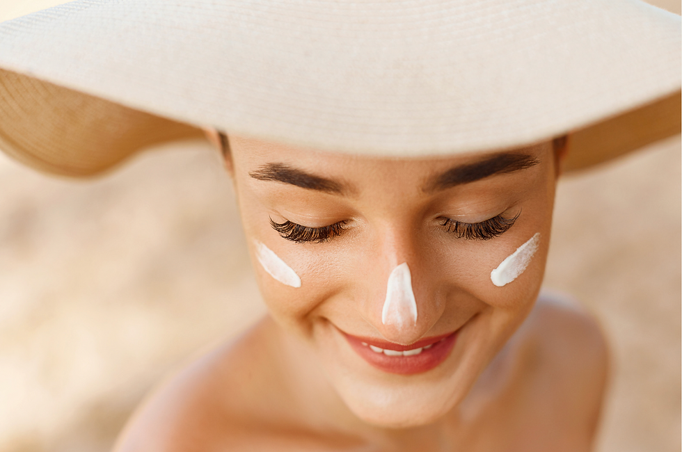 A beautiful lady wearing sunscreen and a hat