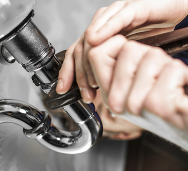 Plumber Fixing Pipe