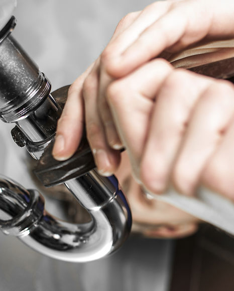 Plumber Fixing Pipe