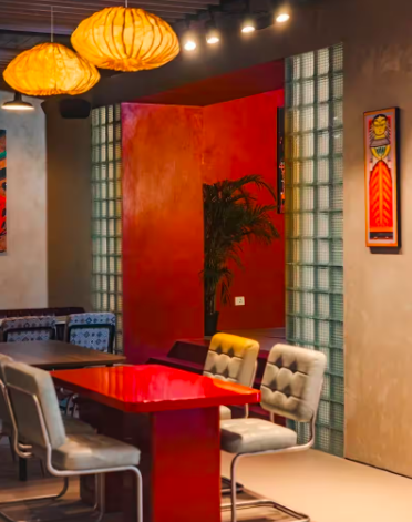 Odd Culture brings a vibrant personality to Gurugram with an 80-seater space that moves beyond conventional neutral interiors. Designed by Meta Noia Designs, the restaurant is built with bold colours like icy blue and bold red hues. Custom furniture, an open kitchen counter and a cosy rear lounge create distinct spaces for different dining moods. The alfresco seating adds an inviting outdoor element during the cooler months. A vinyl corner featuring the Makhijas’ personal collection, including records by Donna Summer and Jimmy Cliff, adds a nostalgic touch, while curated merchandise gives the space an added sense of character.