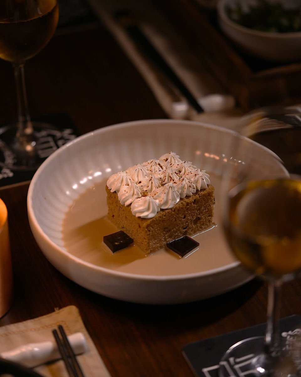 The cocktail menu features both signature creations infused with Asian ingredients—like lemongrass, yuzu, and kaffir lime—and timeless classics such as the Long Island Iced Tea, Screwdriver, and Bloody Mary, each expertly crafted and beautifully presented.