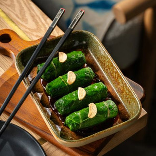 Sushi options like the Hot Salmon Alaska Roll shine alongside comforting mains like Mapo Tofu and Lemongrass Steamed Fish.