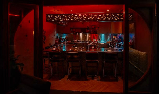 Hidden beneath the lively atmosphere of Barbet & Pals lies Cavity Bar, an intimate speakeasy-style destination that feels like one of Gurugram's best-kept secrets. Designed for those who appreciate expertly crafted cocktails made using select ingredients, Cavity Bar boasts moody interiors, and a more exclusive drinking experience, Cavity Bar offers a refreshing contrast to the bustling energy upstairs. The moment you step inside, the venue transports you into a world where cocktails become conversations and every corner feels thoughtfully curated.