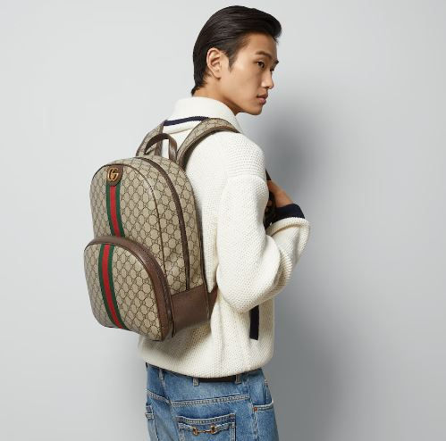 The signature style bag from the Ophidia collection features a web stripe with Double G hardware, something which distinguishes the Ophidia line of bags. This bag is a part of their men's Spring collection 2024 and has garnered all the love for the functionality, color and design of the bag. A sturdy look with beige and ebony canvas paired with striking green and red stripes, makes this Gucci backpack a favorite among luxury backpack lovers.