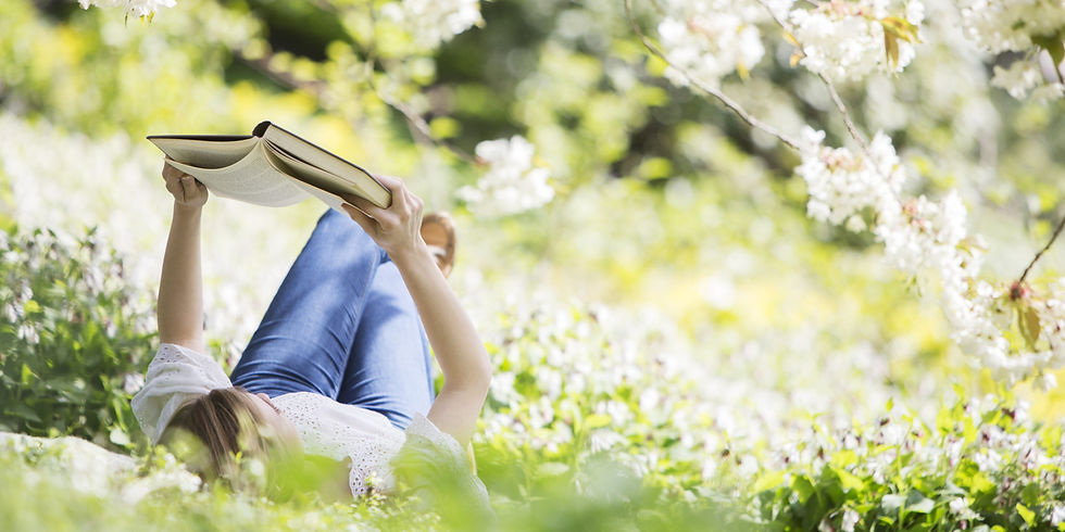 girl in grass reading.jpg