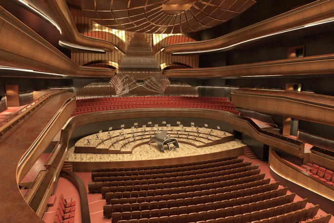 Wide concert hall with piano, orchestra seating, red seats, and glowing balconies.