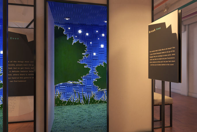 Blue acoustic chamber with green cutout screens and star lights.