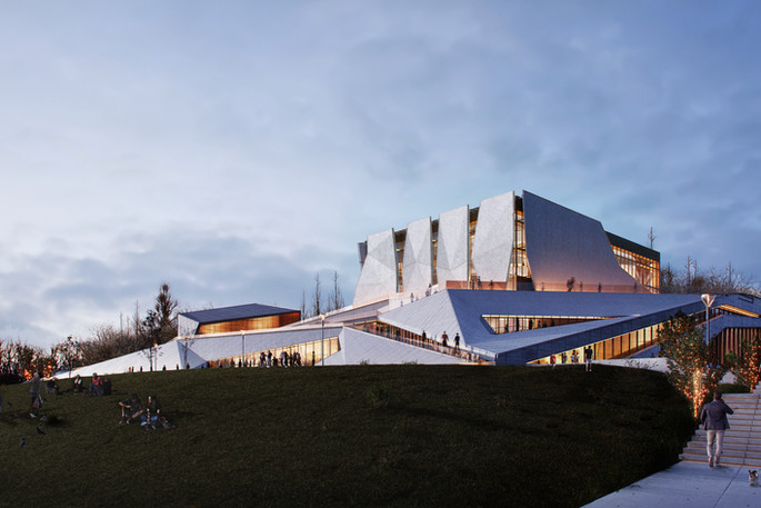 Twilight exterior of a white faceted hall with visitors on the lawn and steps.