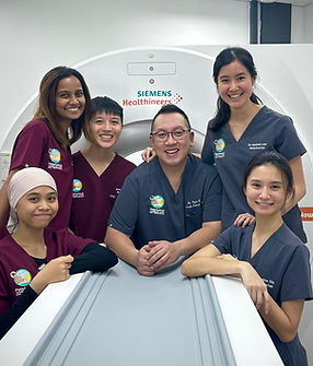 Picture of the team in the CT scan room