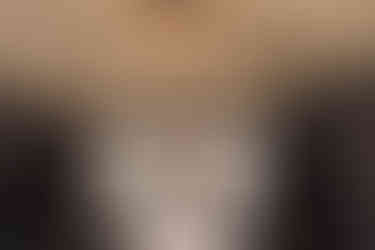 Wedding dress with long train and puff sleeves, walking in with husband