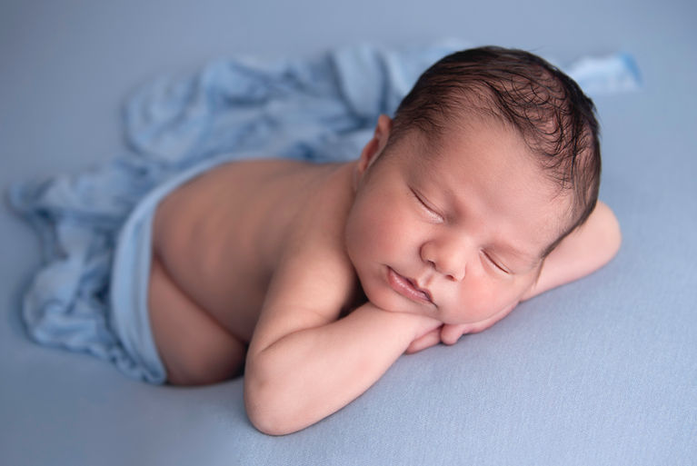 Newborn baby boy photographed in East Grinstead