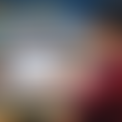 A young Indian student sits at a desk using a laptop to fill out the PM-YASASVI Post-Matric Scholarship application on the National Scholarship Portal. The screen shows an online form, with icons illustrating steps like registration, form filling, and document upload, along with a banner encouraging users to apply online.