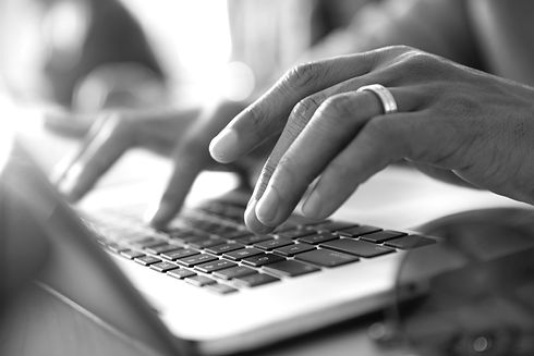 Man Typing on a Laptop_edited.jpg