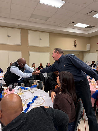 Michael Bastian speaking with residents at a community gathering in Woodlands, Mississauga Ward 6