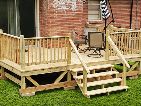 Portable deck installed in front of a home.