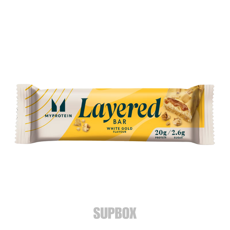 MyProtein Layered Bar 60g white gold flavour protein bar in wrapper.