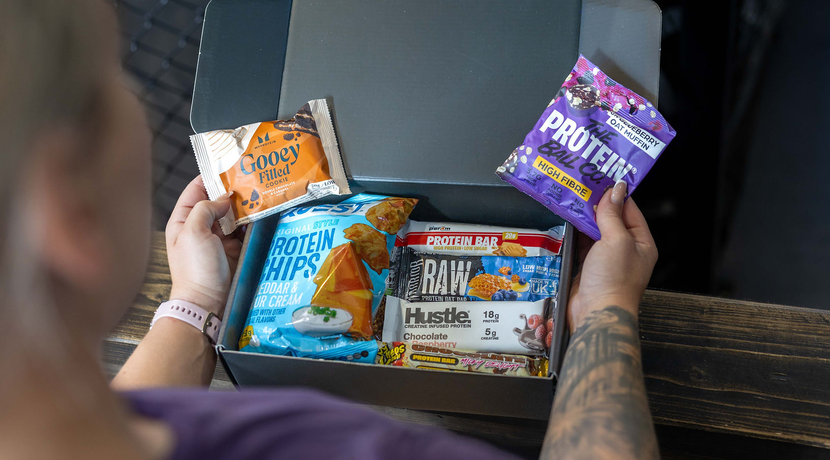 an open box of a protein snack box by supbox