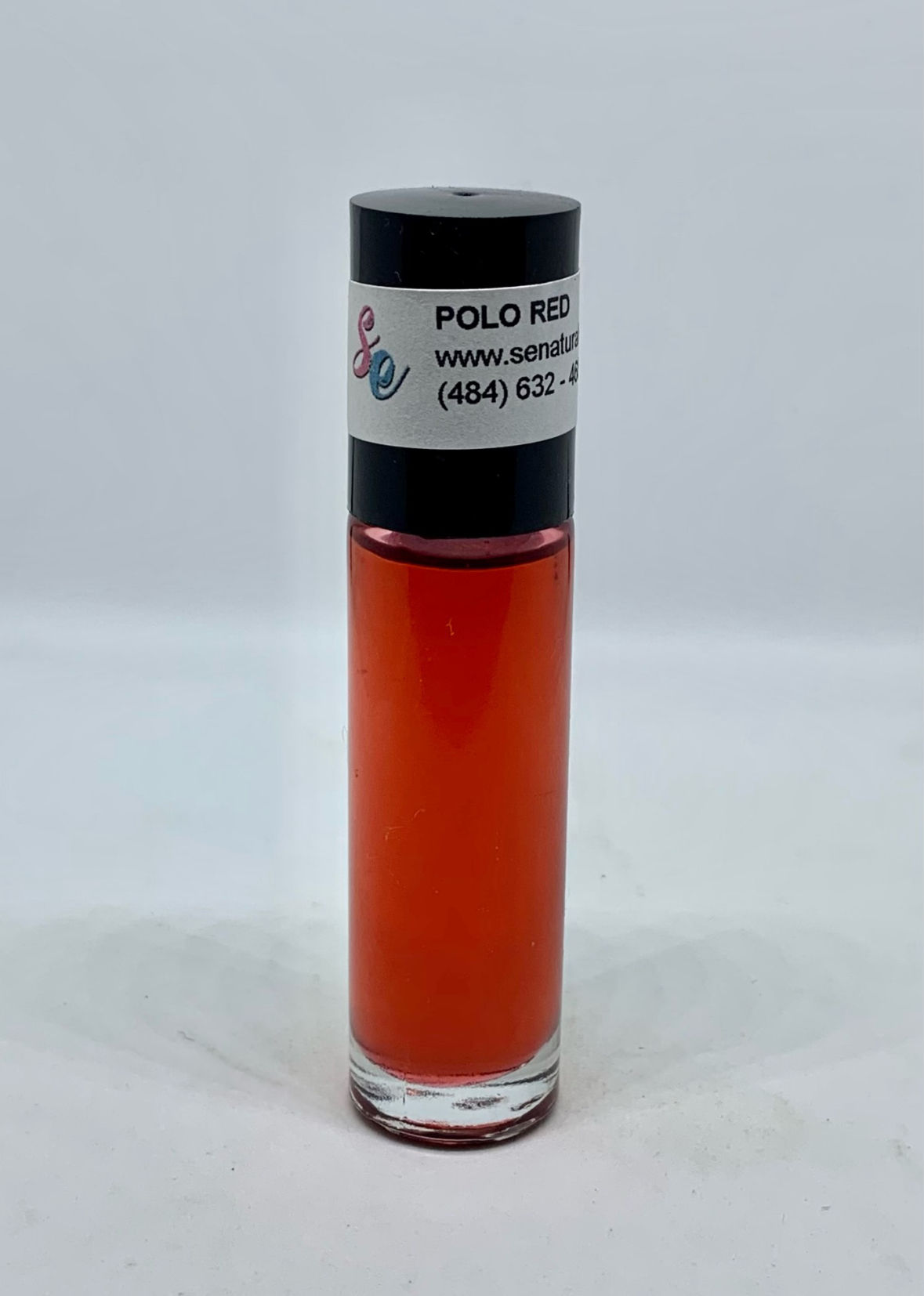 red oil in a glass bottle called polo red