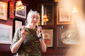 Comedian on the mic at Second Row Comedy, Wednesday stand-up night at The Birdcage pub, Hackney