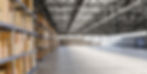 Boxes-installed-in-rows-inside-warehouse-1319814.jpg