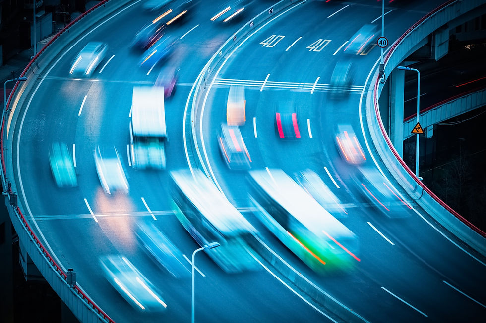 vehicles-motion-blur-on-curve-bridge-approach-2026-01-07-06-52-16-utc.jpg