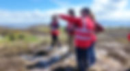 A group of cyclists on the panoramic e-bike tour, admiring the view of Howth
