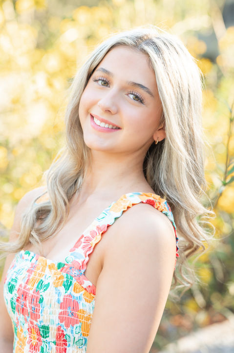 Classic senior portrait taken in Fairhope, Alabama, featuring a Baldwin County Virtual School senior with a natural smile and relaxed pose.