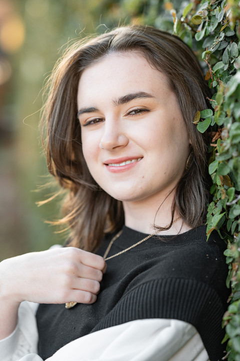 High school senior portraits in Mobile, Alabama taken near parks and fountains downtown