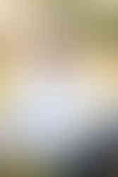 High school senior guy wearing a classic button-down shirt during a professional senior portrait session by April Grayson Photography on the Gulf Coast of Alabama. cowboy hat