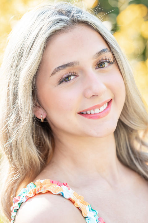 High school senior portrait of Ashley during a Fairhope senior photo session, featuring a confident Baldwin County Virtual School senior in a natural outdoor setting.