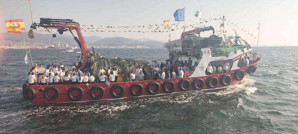 De procesión con la Virgen del Carmen