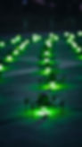 A mesmerizing drone show paints the night sky with synchronized lights and patterns. A sym