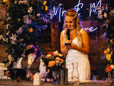 Springtime floral arch for a wedding ceremony at The Little Green Wedding Barn, Suffolk