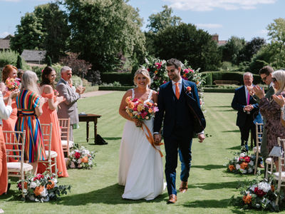 Hot pink, orange and white wedding flowers 