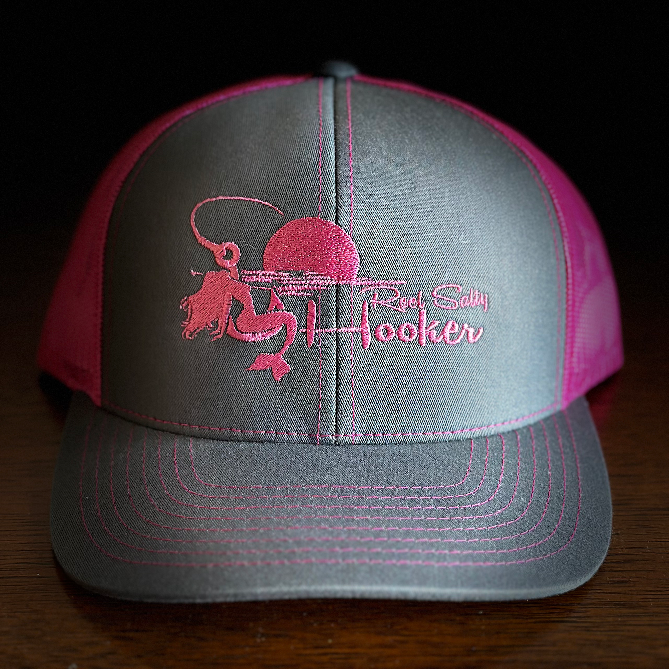 Reel Salty Hooker Neon Pink/Charcoal Trucker Hat