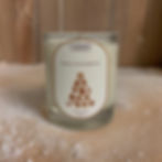 Baked Gingerbread Christmas candle on a snowy base, featuring a warm, spicy fragrance perfect for the festive season.