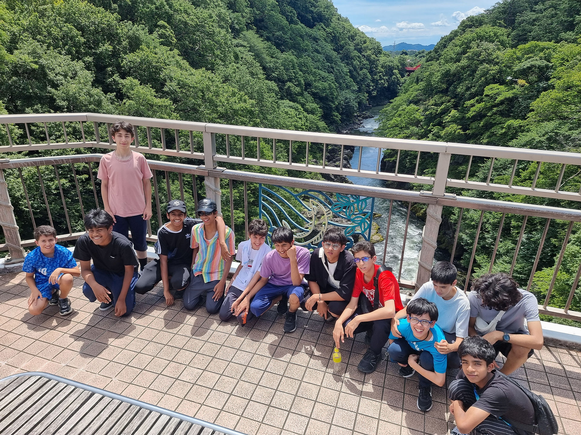 Group photo at bridge