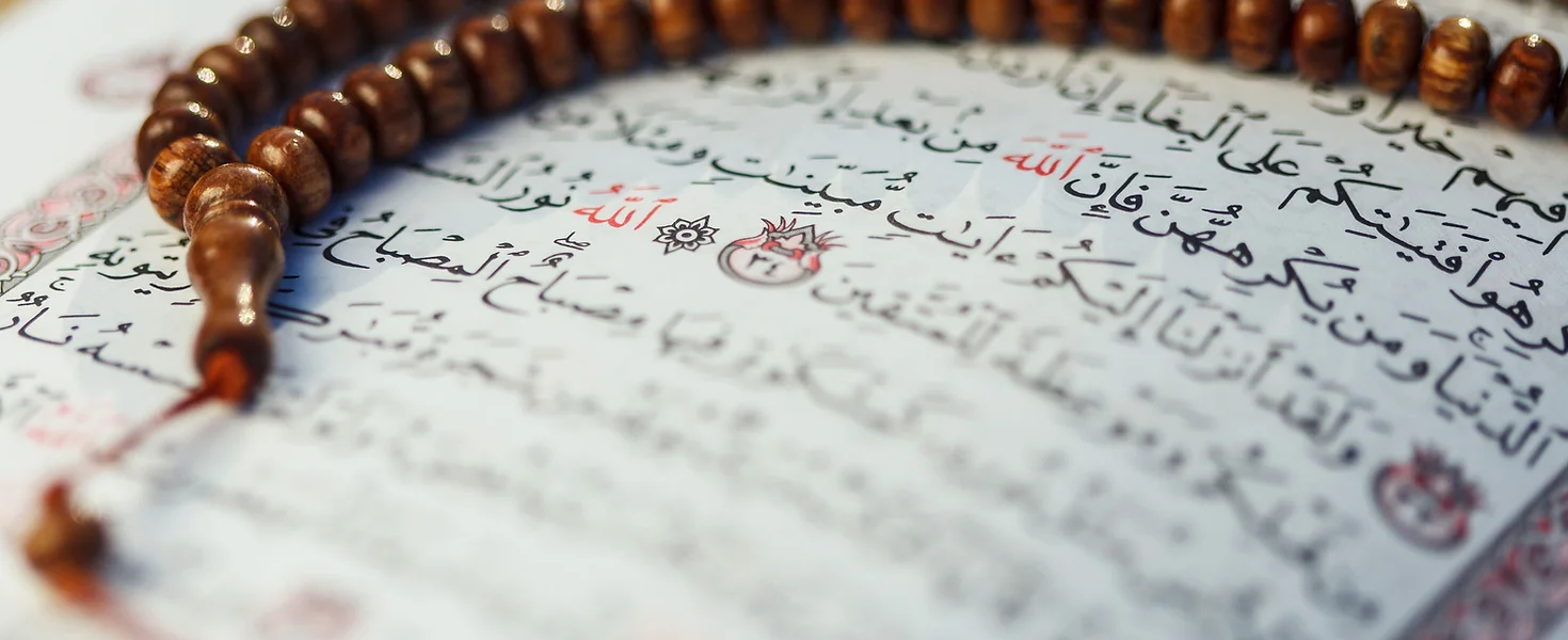 Quran and Prayer Beads.webp