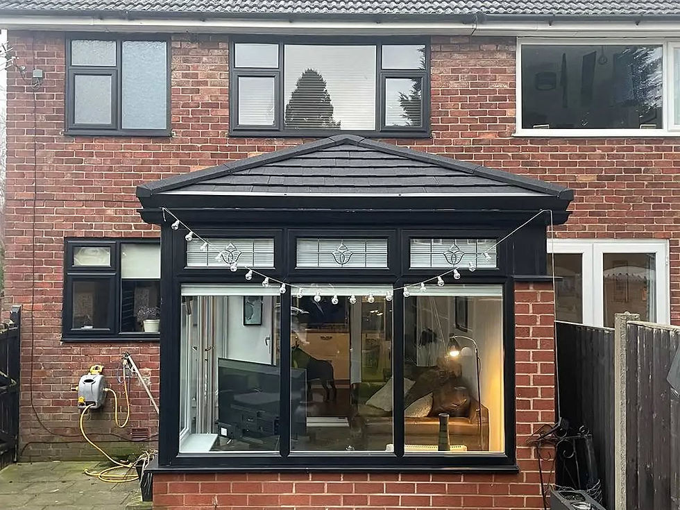 House rear displaying an insulated conservatory roof conversion   