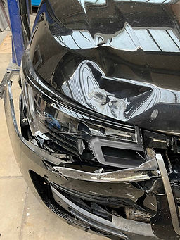 close up view of car dented part