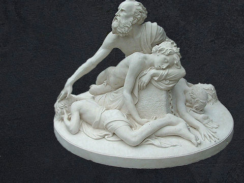 Classical white marble sculpture depicting mythological figures on dark background