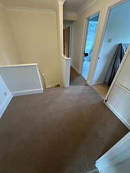 right upper floor landing beautifully covered in high quality brown carpeting