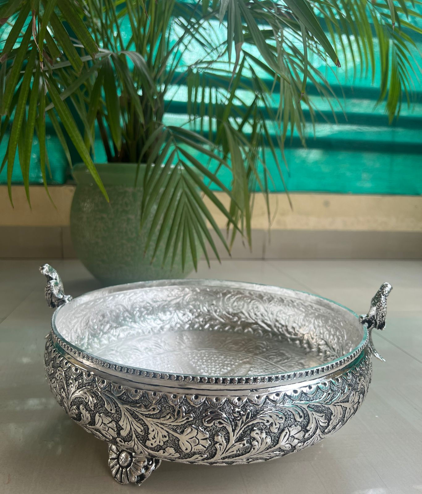 2 side parrot Round urli with beautiful floral legs and carving