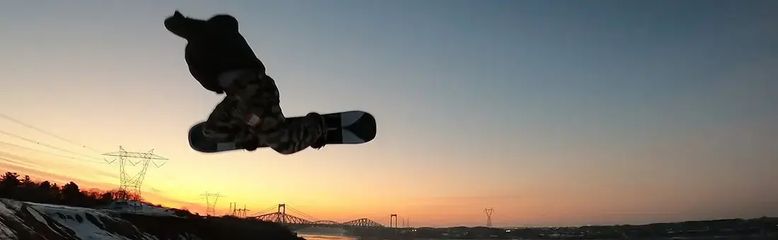 Big Air Snowboarding photo of riders wearing snow helmet and goggles