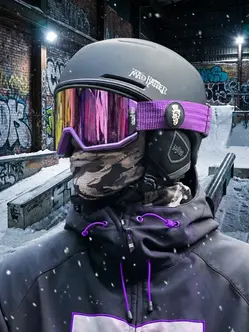 Snowboarder wearing Plum Crazy Purple Snow Goggles with magnetic lens