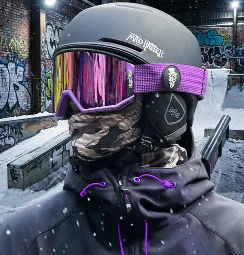 Snowboarder wearing Plum Crazy Purple Snow Goggles with magnetic lens