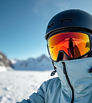 Snowboarder wearing a helmet and goggles