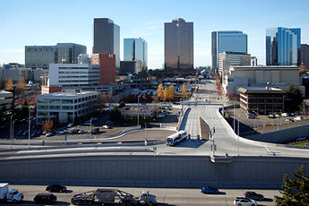 Bellevue_skyline_and_NE_6th_Street_bus_ramp_(12916302384).jpg